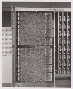 The Mark I Perceptron hardware, a large cabinet with a patch panel of wires used to implement the perceptron algorithm